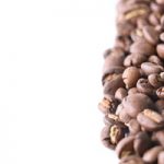 コーヒ豆が横半分に散らばるA4サイズ背景素材