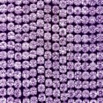 紫色のスパンコールがキラリと光るA4サイズ背景素材