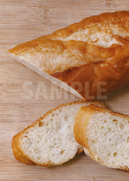 カットされたフランスパンのA4サイズ背景素材