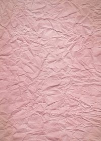 ピンク色のしわくちゃの紙のA4サイズ背景素材