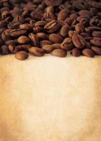 コーヒ豆が上部分に散らばる茶背景A4サイズ素材